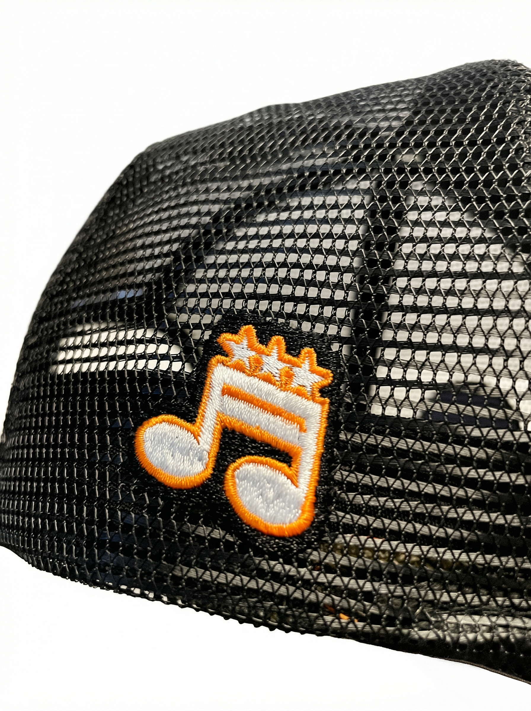 Front Porch Freestyles OG Trucker Hat black orange DMV music note embroidered patch side detail