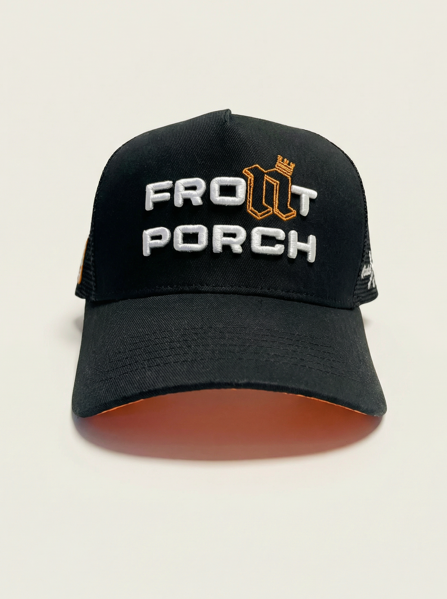Front Porch Freestyles OG Trucker Hat black 3D puff embroidery orange underbrim front view