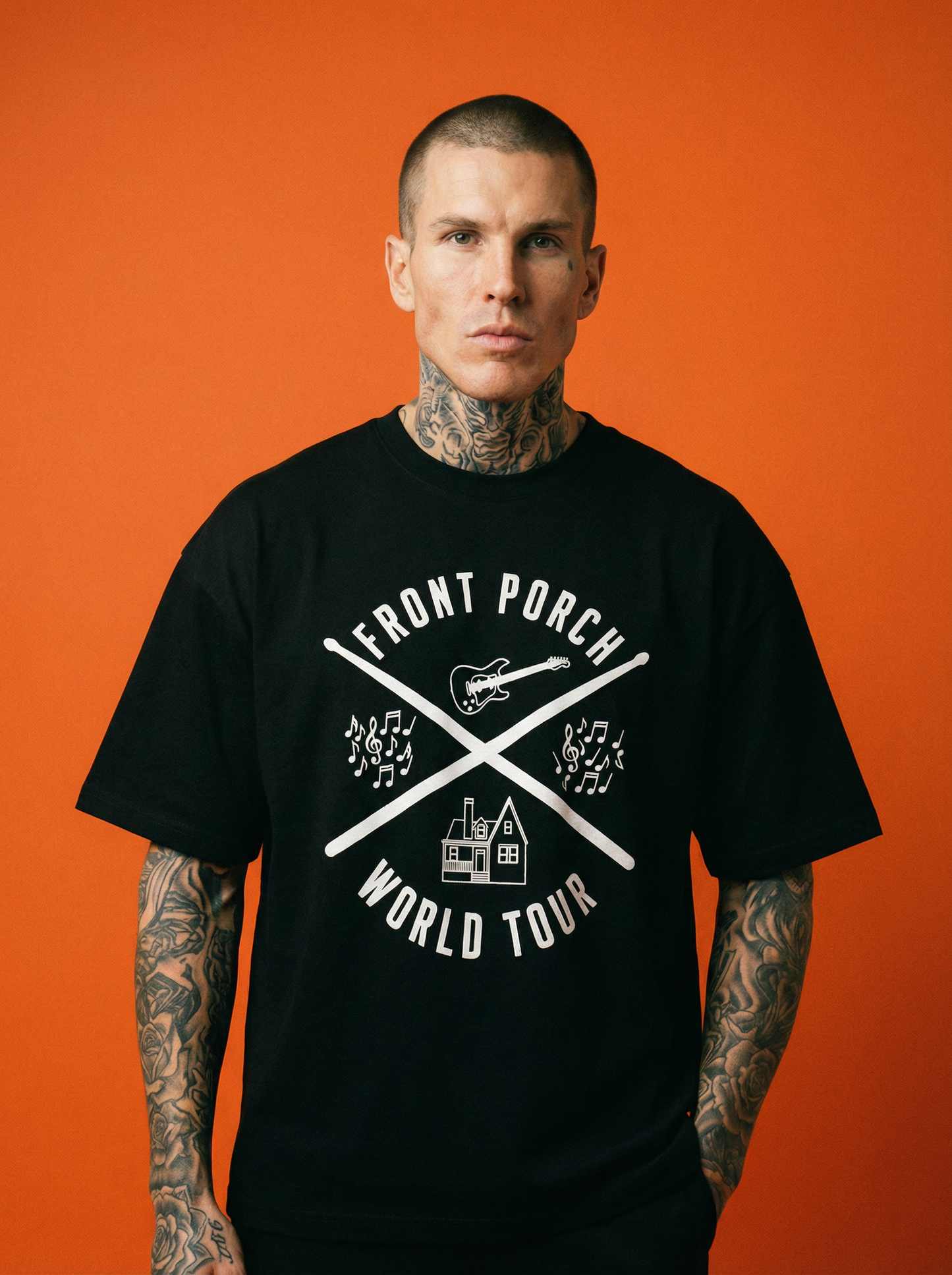 Front Porch Freestyles World Tour Logo Tee black worn male model orange background music streetwear